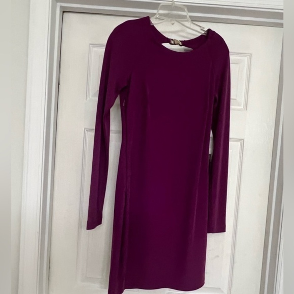 Bebe Mini Dress with string details in back, NWT, size M